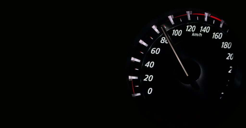 Speedometer reading showing speed in km/h on a dark background.